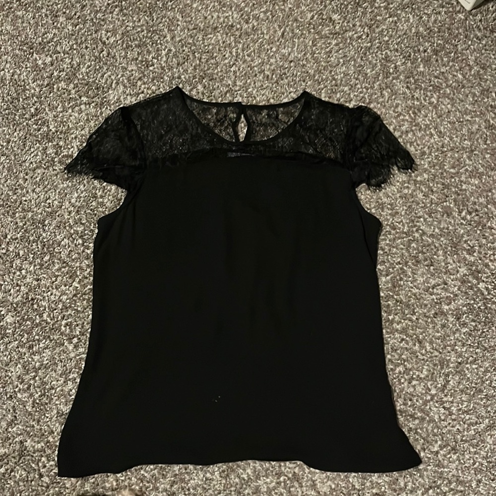 Woman’s dress shirt.